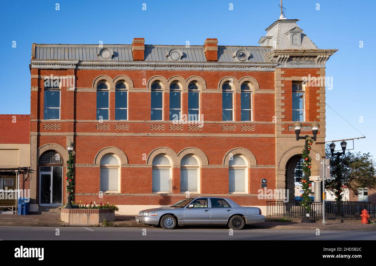 L'ancien bâtiment en briques rouges de Bay City, comté de Matagorda, Texas, États-Unis. Banque D'Images