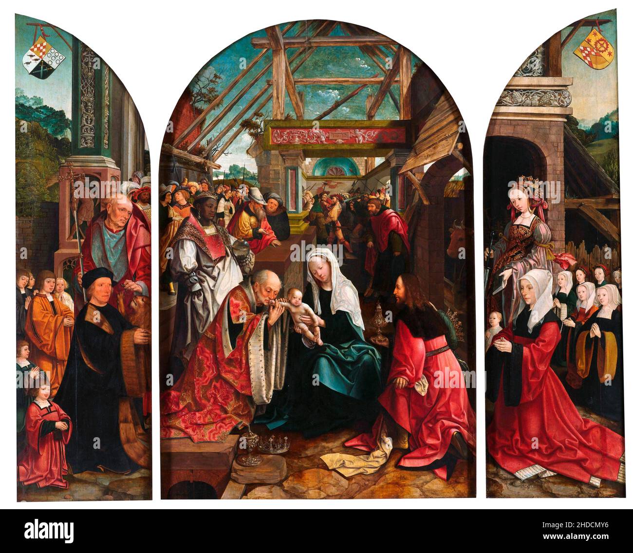 Triptyque avec l'adoration des Mages (panneau central), le donneur et ses six fils avec St Jérôme (aile intérieure gauche), l'épouse du donneur et ses sept filles avec Sainte Catherine d'Alexandrie (aile intérieure droite), St Christopher (aile extérieure gauche) et St Antony Abbé (aile extérieure droite)Par l'artiste néerlandais Jacob Corneliszoon van Oostsanen (avant 1470-1533), huile sur panneau, 1517 Banque D'Images