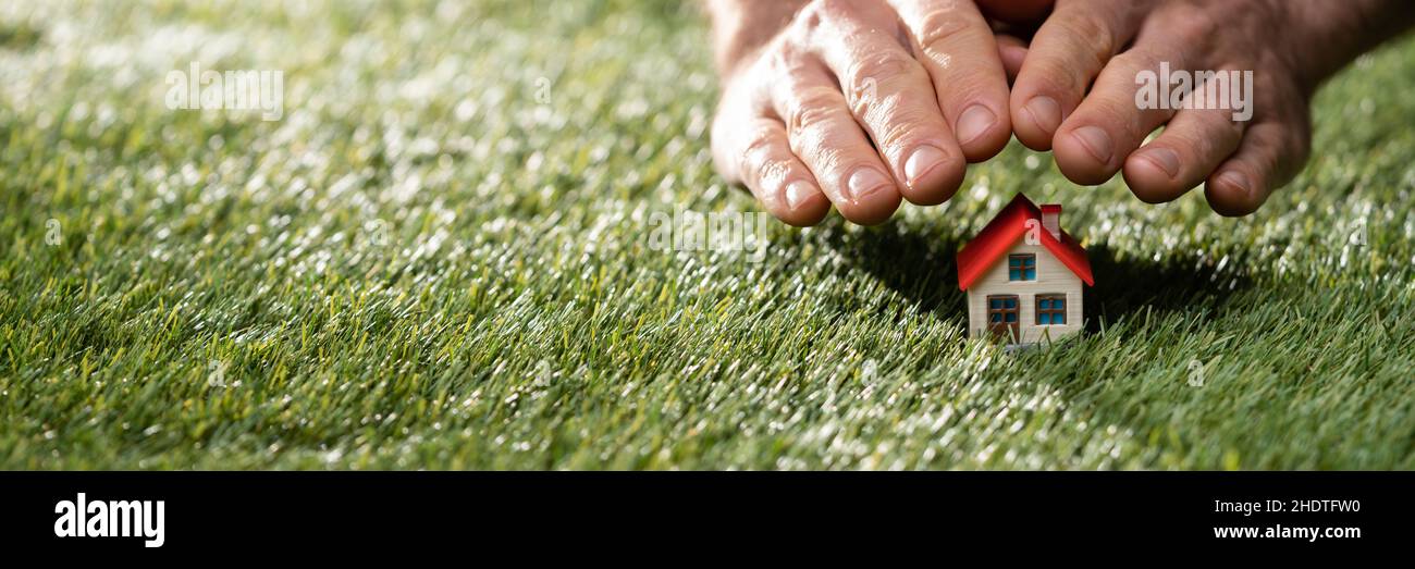 Assurance de biens immobiliers. Conseiller personnel. Entreprise verte Banque D'Images