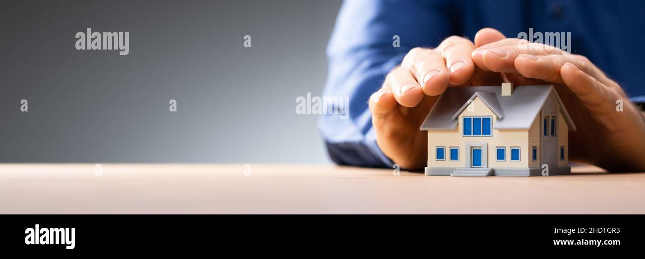 Protection de la maison et assurance hypothécaire.Sécurité immobilière Banque D'Images