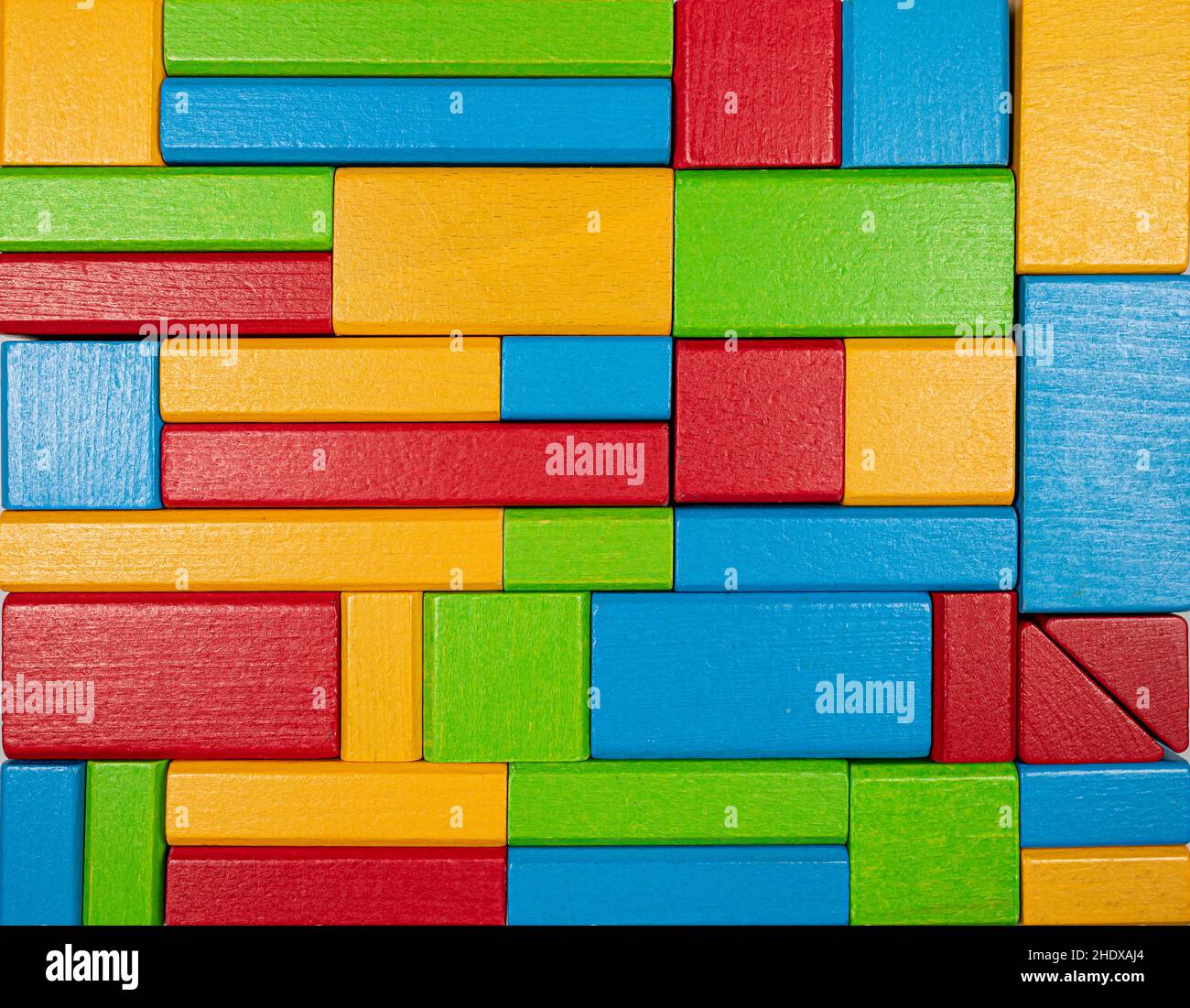 fond coloré en blocs de jouets en bois Banque D'Images