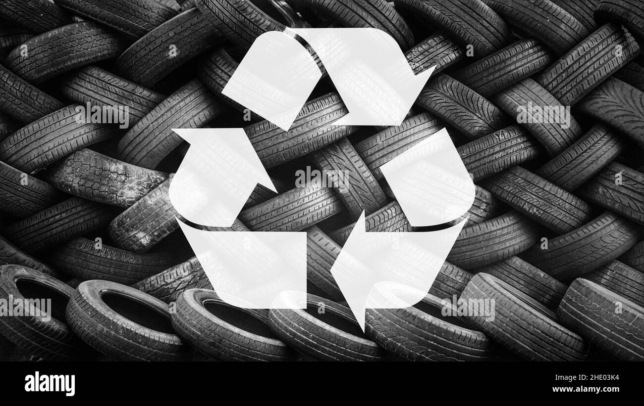Symbole de recyclage et arrière-plan des pneus Banque D'Images