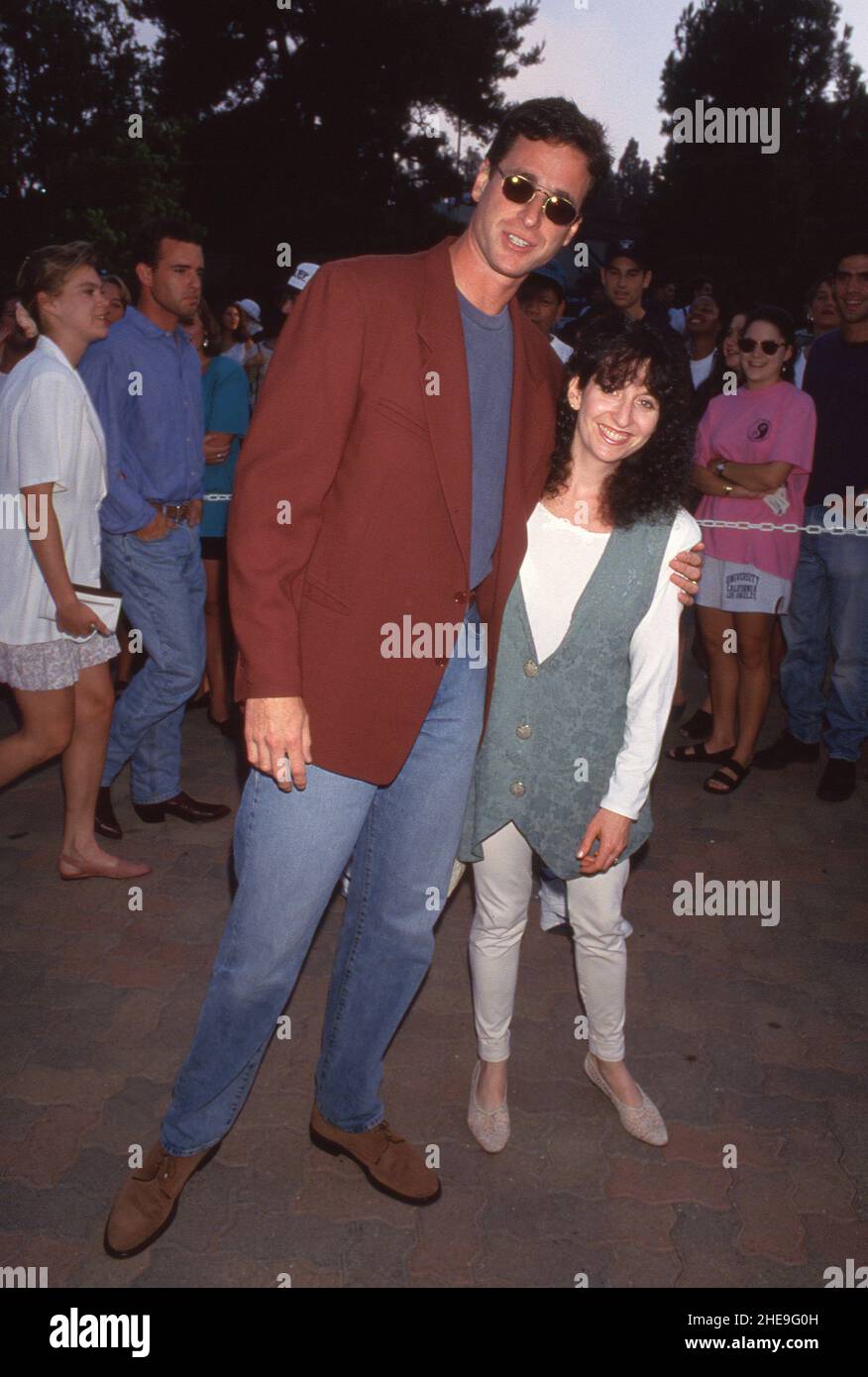 Bob Saget et sa femme Sherri Kramer assistent à une soirée au Net Benefit le 2 août 1993 au UCLA tennis Centre de Westwood, en Californie.Crédit: Ralph Dominguez/MediaPunchBob Saget Circa années 80 crédit: Ralph Dominguez/MediaPunch Banque D'Images