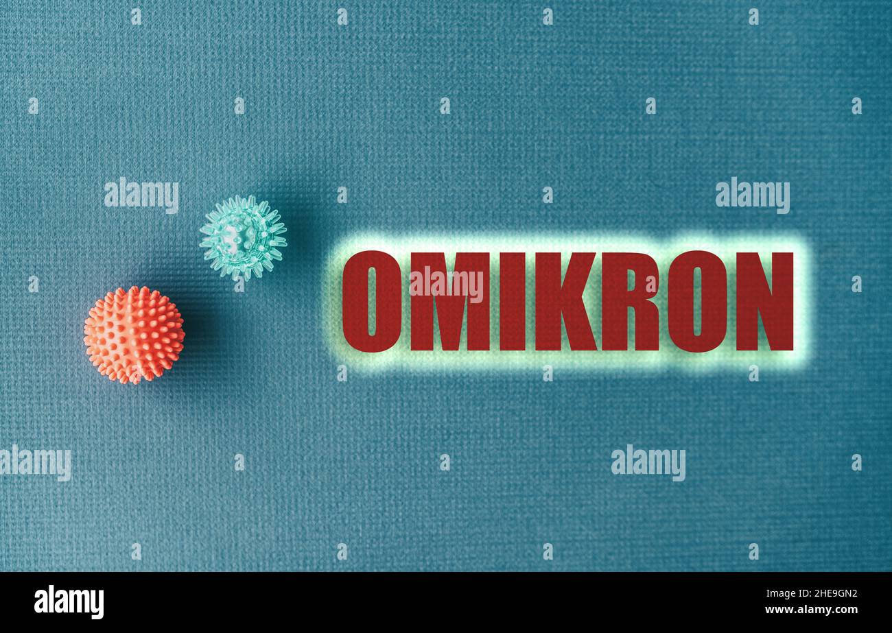 Variante D'OMIKRON différente du coronavirus précédent.Signe de texte de l'armoire bleu.OMICRON écrit en grec Banque D'Images