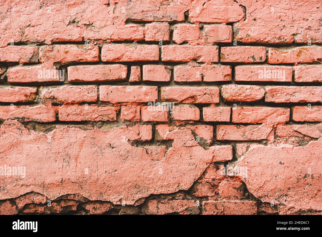 Rose corail peint vieux mur de brique comme arrière-plan, grunge la texture de temps Banque D'Images