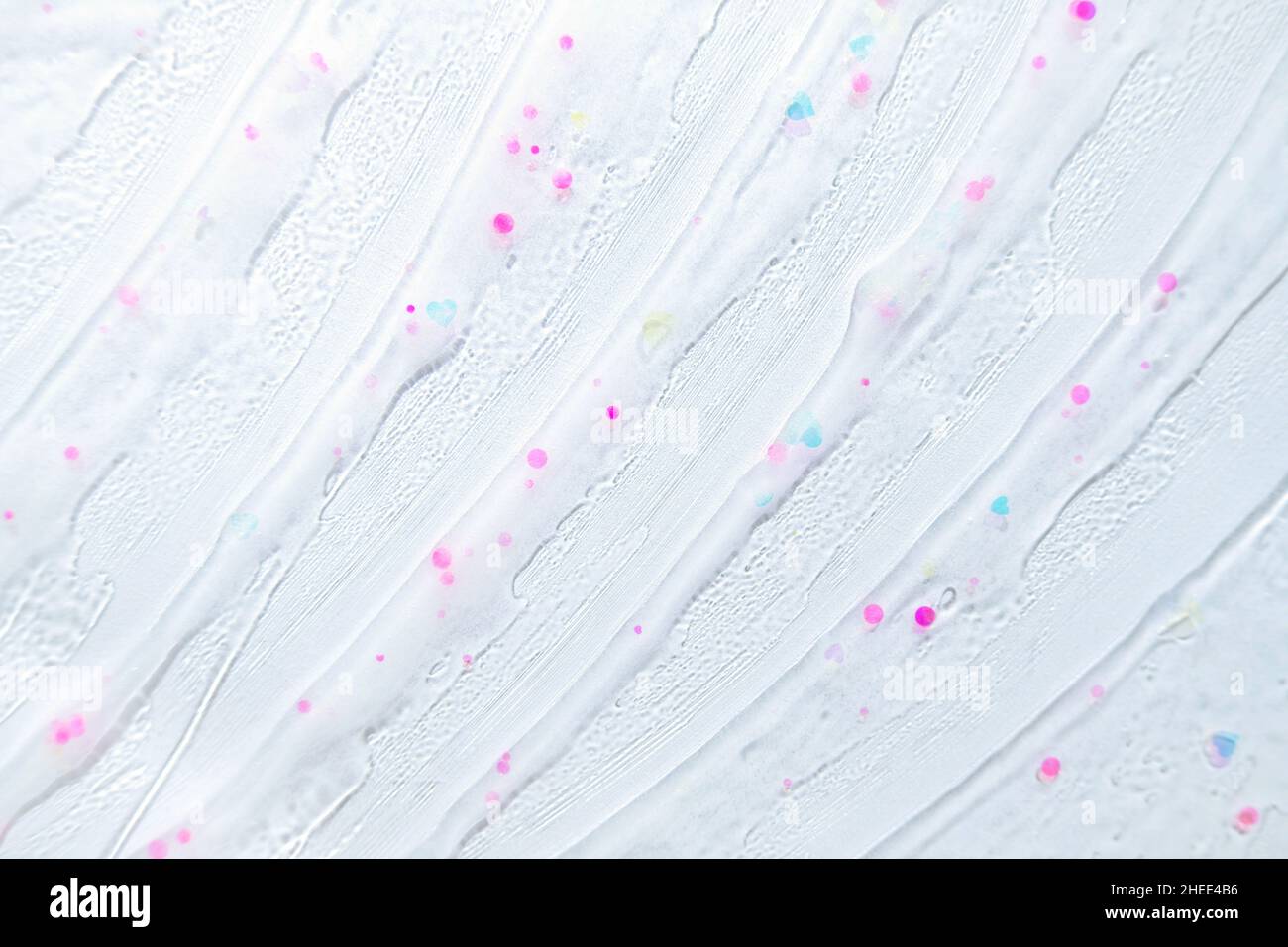 Particules scintillantes abstraites de couleur arc-en-ciel.Macro Banque D'Images