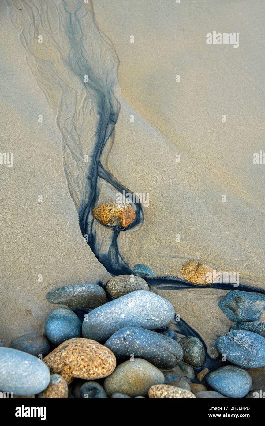 Textures naturelles et design à la plage pendant la marée basse Banque D'Images