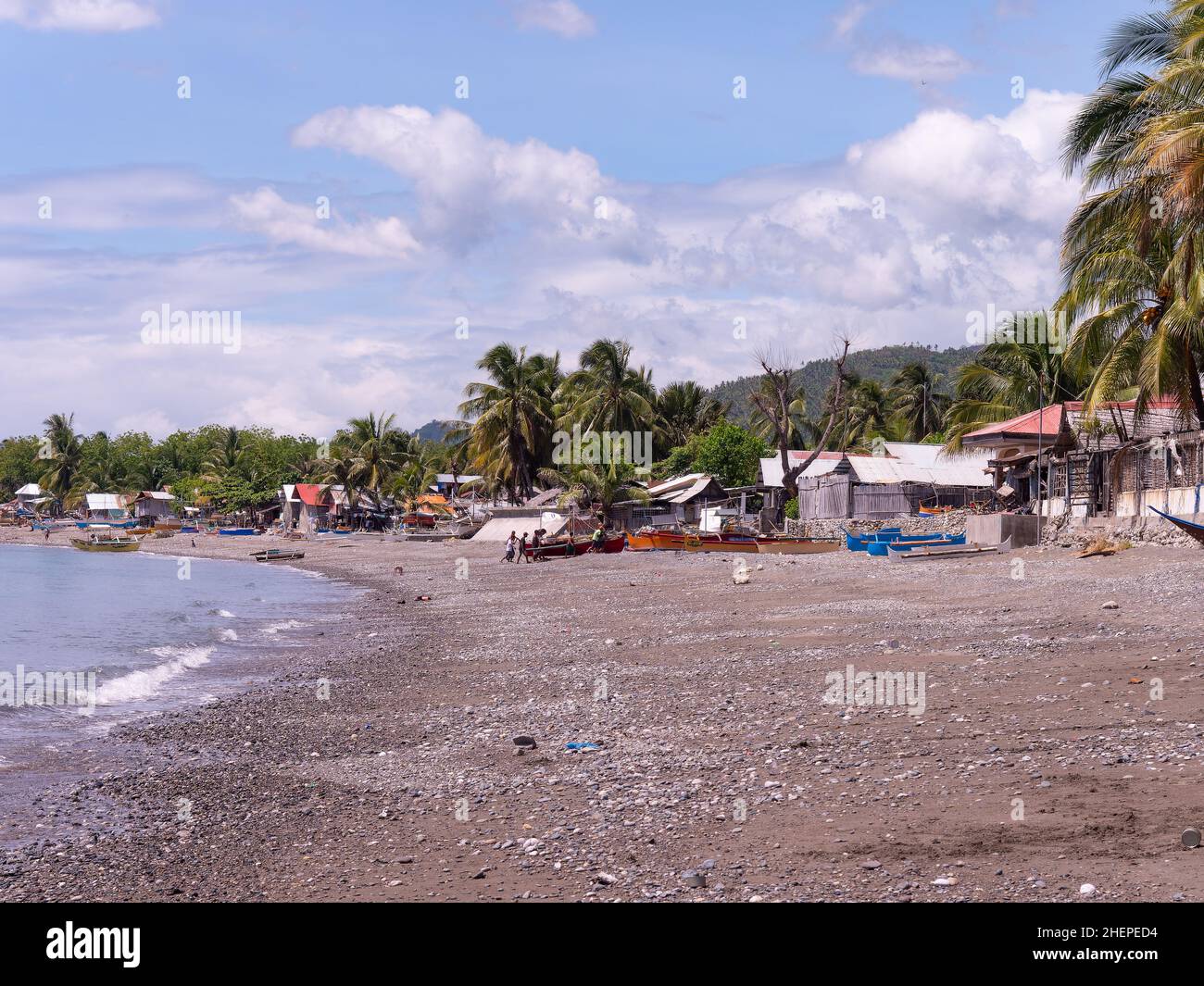 La plage de Maasim, une petite ville de la province de Sarangani à la pointe sud de Mindanao, l'île principale la plus méridionale des Philippines.Le peo Banque D'Images