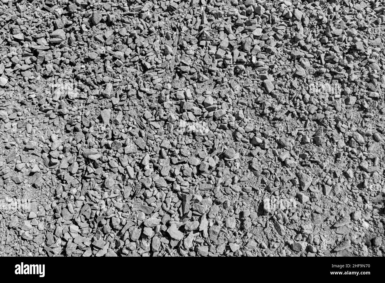 mélange sec de pierre concassée avec ciment et additifs basse température pour la fabrication de mortier de béton pendant la construction en hiver avec un négatif Banque D'Images