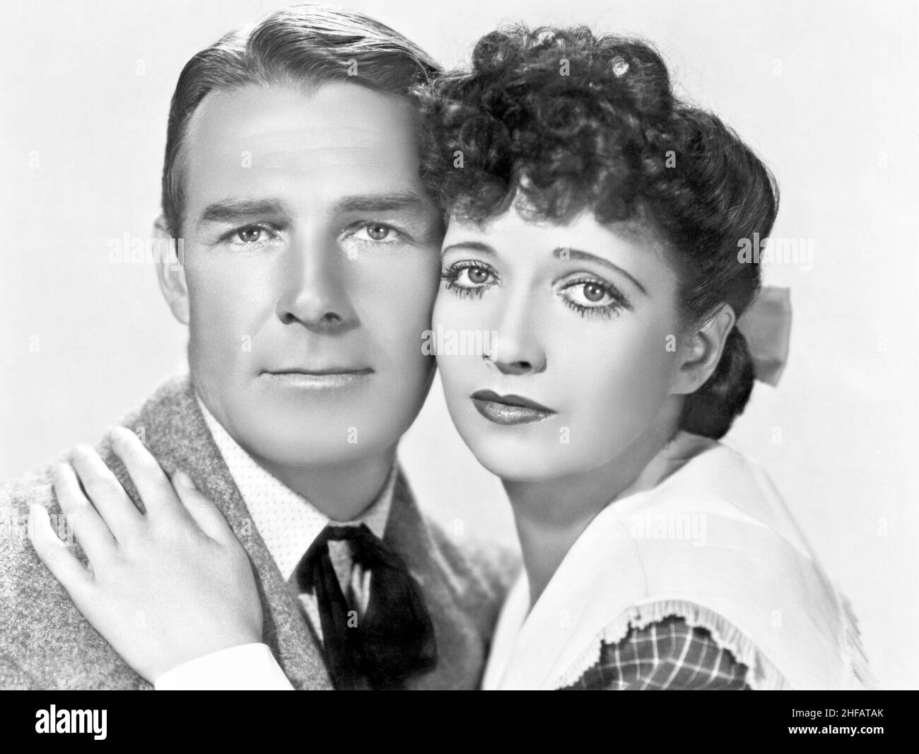 RANDOLPH SCOTT et KAY FRANCIS in QUAND LA RODE DES DALTONS (1940), dirigé par ALAN MARSHALL.Crédit : PHOTOS / Album UNIVERSEL Banque D'Images