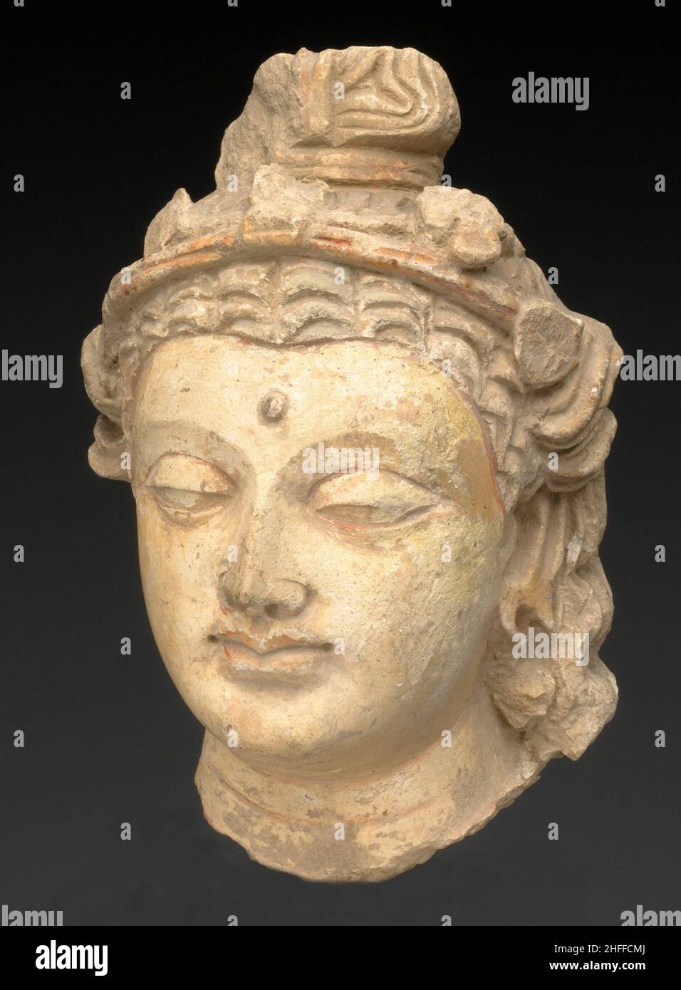 Tête d'un Bodhisattva, période de Kushan, environ 3rd/5th siècle. Banque D'Images