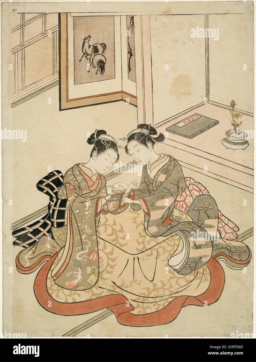 Jeunes femmes jouant au berceau de chat, c.1767/68.Attribué à Suzuki Harunobu. Banque D'Images