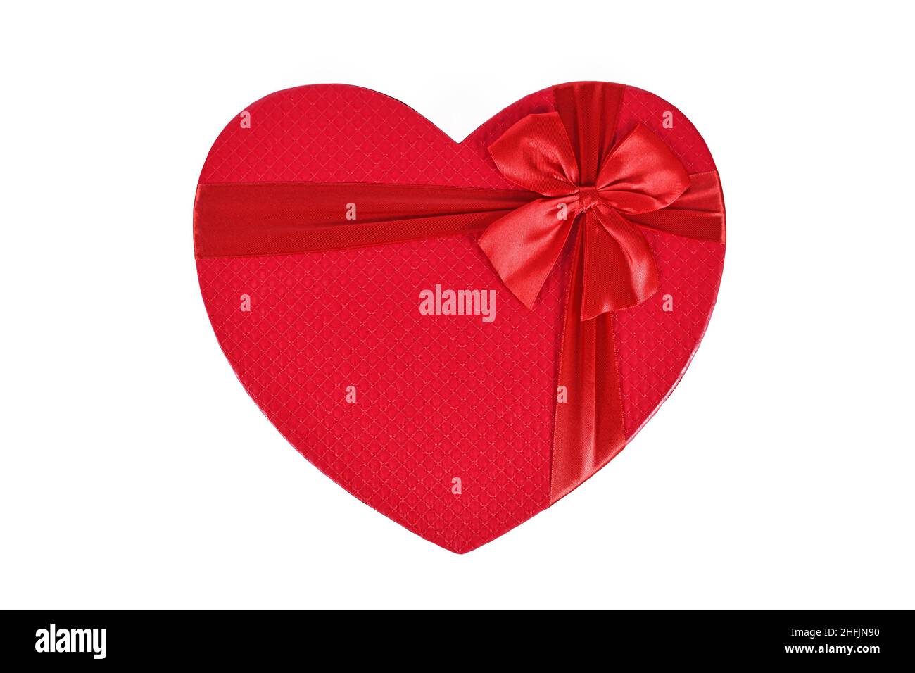 Vue de dessus de la boîte cadeau de Saint-Valentin en forme de coeur rouge sur fond blanc Banque D'Images