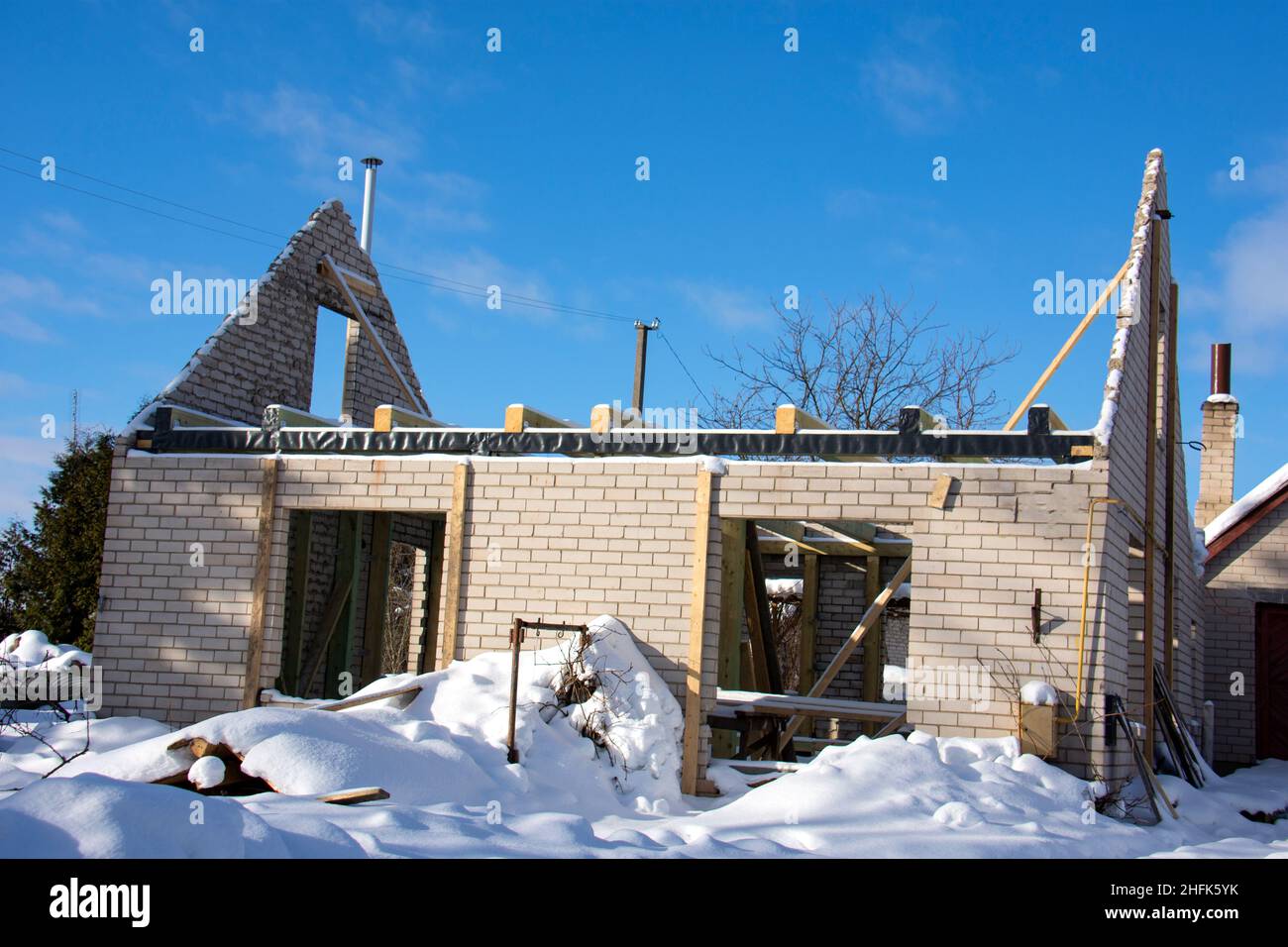 murs de construction de maison en hiver Banque D'Images