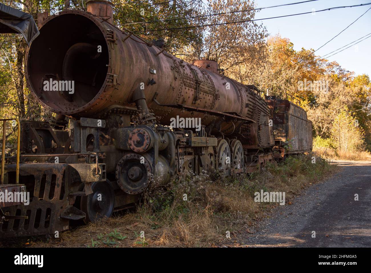 Vieille locomotive à vapeur rouillé dans Siding en attente de restauration Banque D'Images