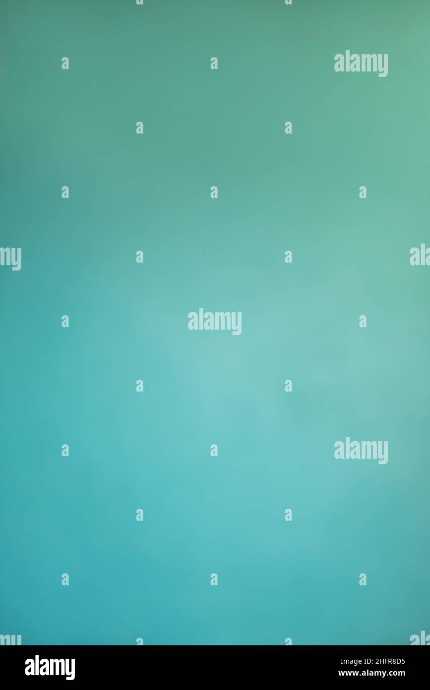 Gros plan d'un mur bleu turquoise texturé qui peut être utilisé comme arrière-plan Banque D'Images