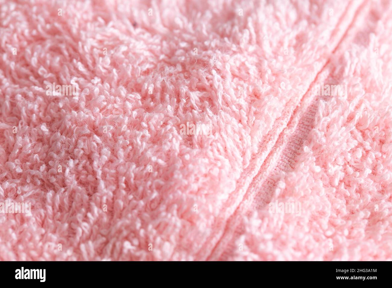 Tissu de fond texturé avec pieu. Tissu doux rose, macro, décoratif Banque D'Images Tissu de fond texturé avec pieu. Tissu doux rose, macro, décoratif Banque D'Images