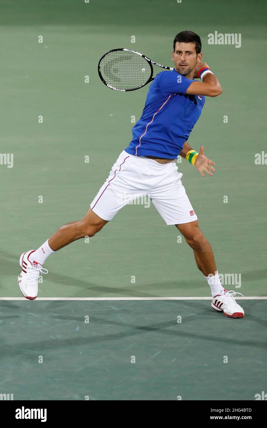 Un joueur de tennis de Novak Djokovic de Serbie est en compétition sur le  terrain aux Jeux Olympiques d'été de Rio 2016.L'athlète serbe célèbre est  le premier classement mondial Photo Stock -