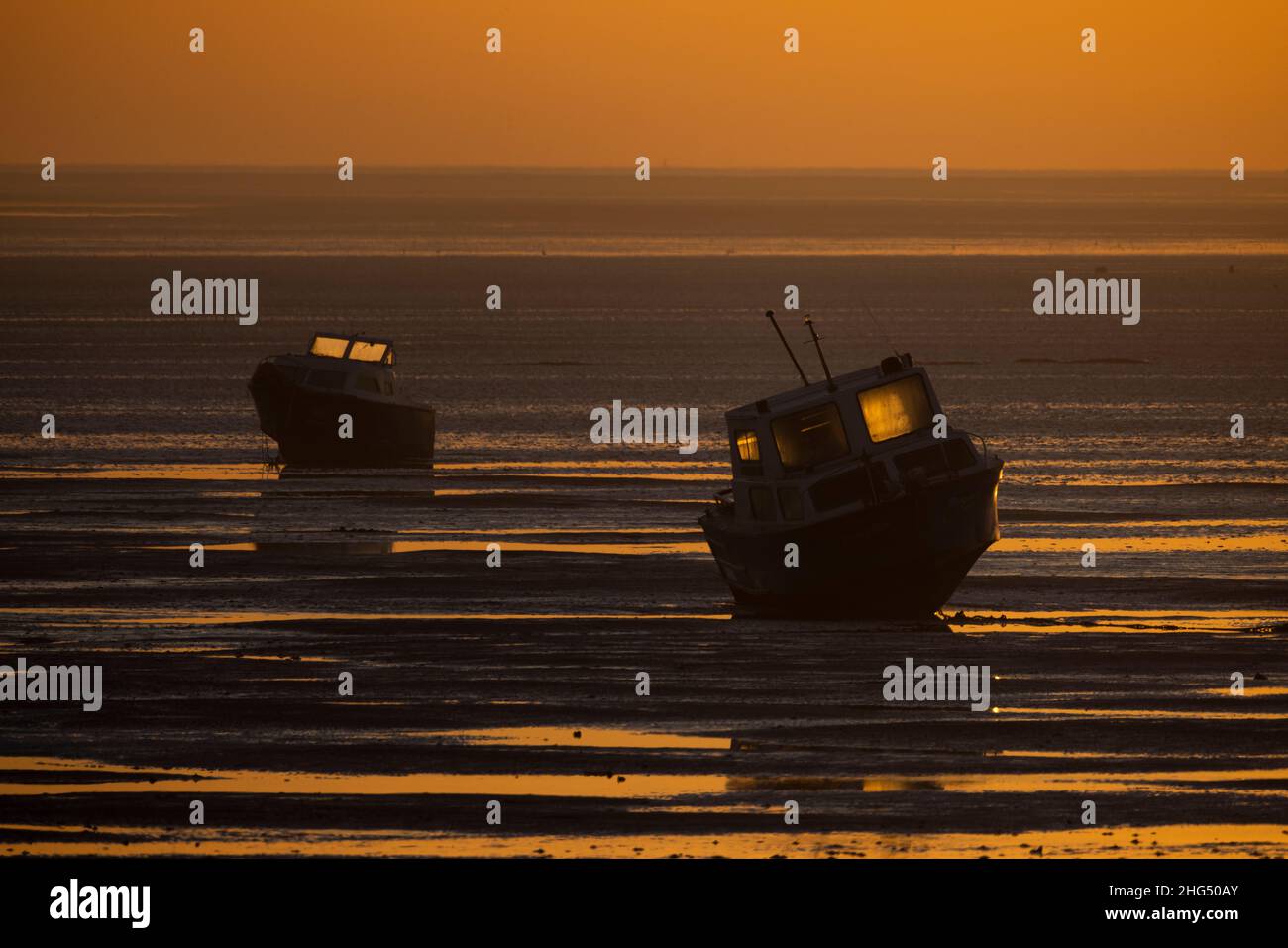 Lever du soleil tôt le matin à Thorpe Bay, près de Southend-on-Sea dans Essex, Angleterre situé sur l'estuaire de la Tamise, Royaume-Uni Banque D'Images