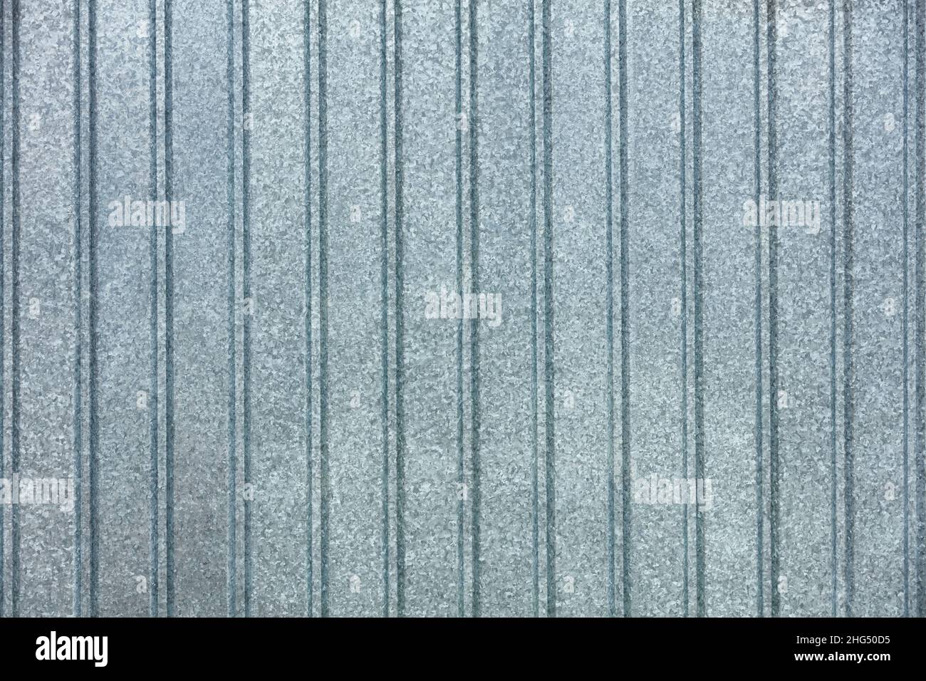 Arrière-plan et texture de la clôture en tôle de fer galvanisée ondulée. Banque D'Images