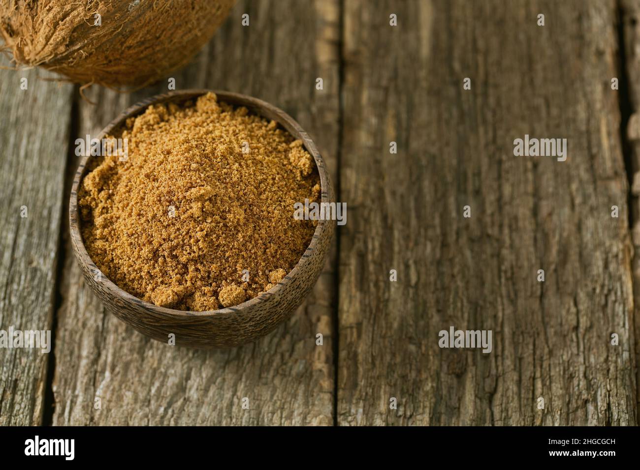 sucre de noix de coco sur surface en bois Banque D'Images