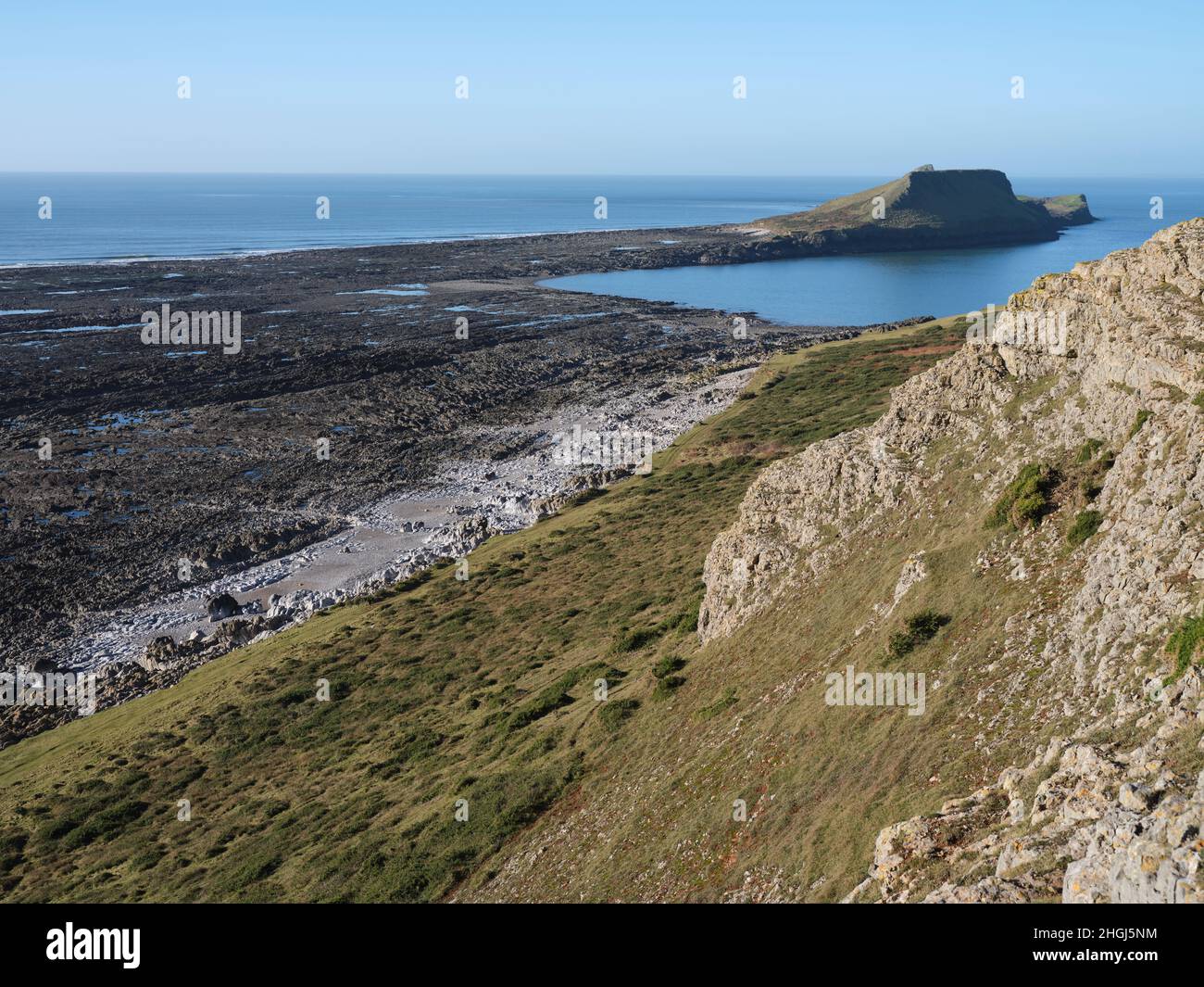 Tête de ver sur la péninsule de Gower, Swansea, pays de Galles, prise du continent en hiver. Banque D'Images