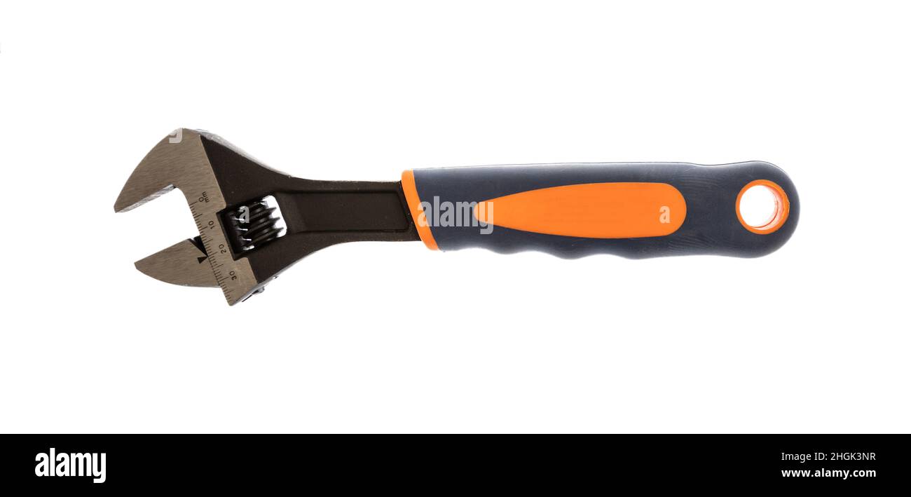 Outil de travail à clé.Manche en caoutchouc noir et orange nouvel instrument isolé découpe sur fond blanc, élément design. Banque D'Images