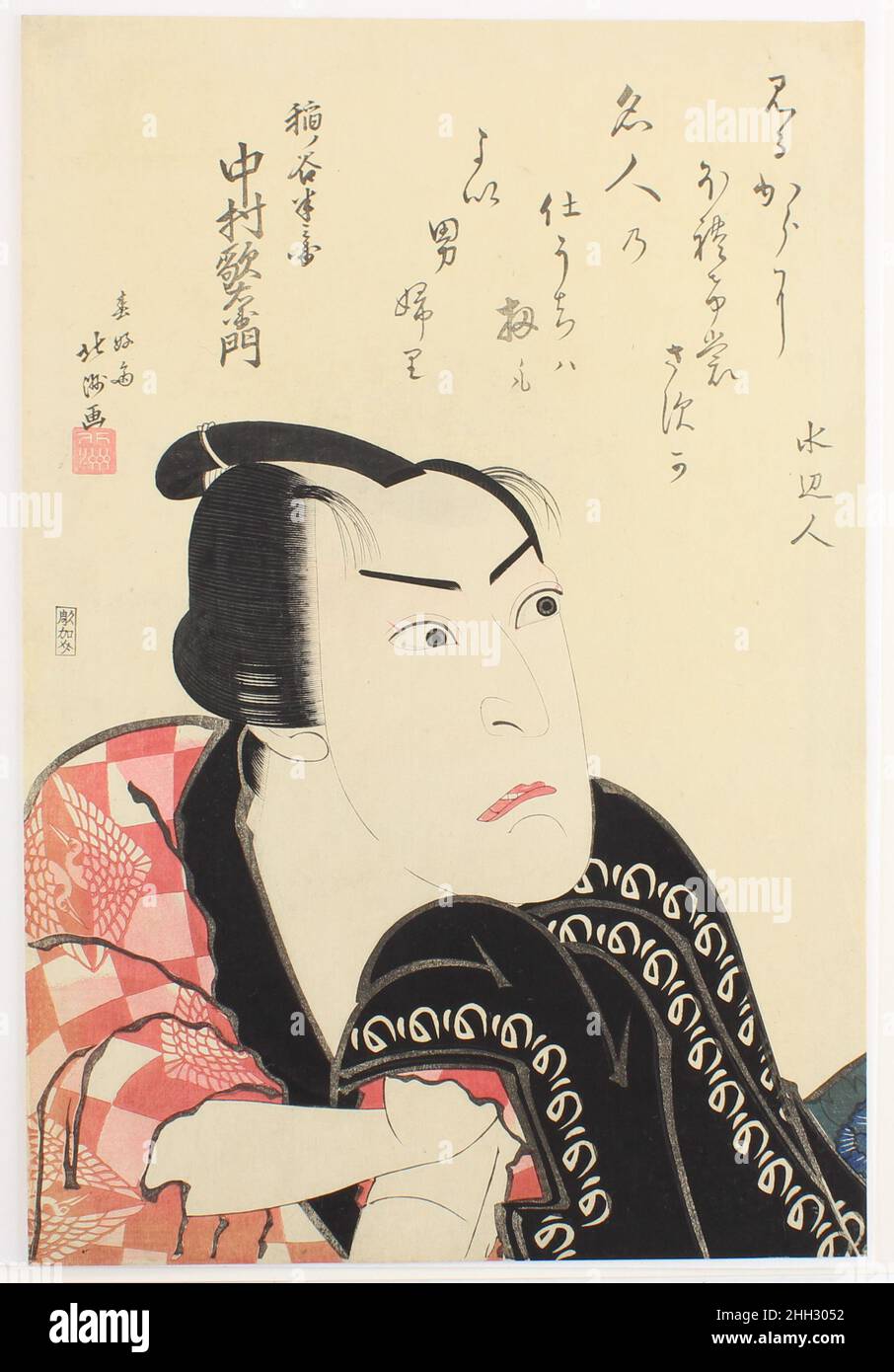 L'acteur Nakamura Utaemon III comme Inanoya Hanbē 1820 Shunkōsai Hokushū 春好斎北洲 l'un des grands "acteurs tout autour" (kaneru yakusha) de la scène d'Osaka qui pourrait jouer n'importe quel type de rôle - homme ou femme, héros ou méchant -Nakamura Utaemon III (1778–1838) est photographié dans un portrait en buste spectaculaire du homme de ville tourné samouraï Inanoya Hanbē.Le poème qui l'accompagne, probablement par un membre d'un club de fans, félicite l'acteur :Mirukara ni horeke mo sasuga meijin no shi-uchi wa sate mo yoi otokoburi — Suihendo même à première vue, il est si captivant — un acteur véritablement qualifié, dont la technique, c'est vrai, lui donne l'air Banque D'Images