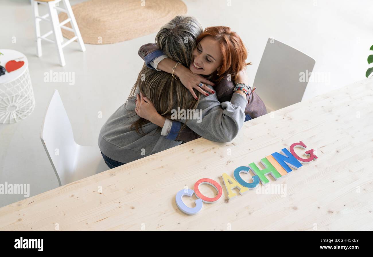 Coacher une femme au bureau à domicile Banque D'Images