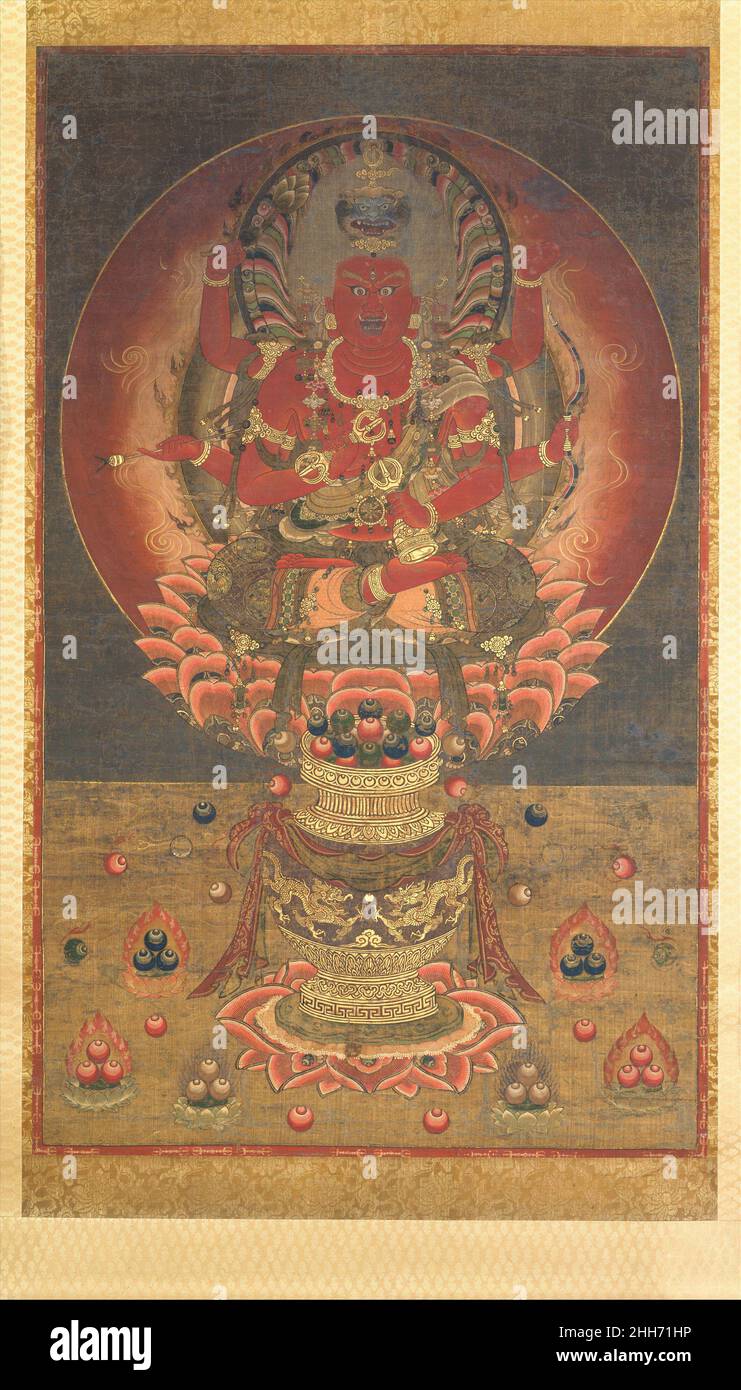 Aizen Myōō 14th siècle Japon le corps rouge de sang et le halo enflammé d'Aizen Myōō, roi de la sagesse de la passion, symbolisent comment, dans la pratique bouddhiste, les énergies violentes de l'carnivalité et du désir peuvent être converties dans la poursuite de l'illumination.Aizen Myōō est l'incarnation de la rage : ses cheveux se terminent, un lion musant s'élève de sa tête, et ses six armes bouddhistes ésotériques branlantes et autres emblèmes du pouvoir.L'arc et la flèche dans ses mains du milieu sont des attributs appropriés de Kama, le dieu hindou de l'amour.Contrairement à cette colère juste, les joyaux de la bonne fortune forment des indices flamboyants Banque D'Images