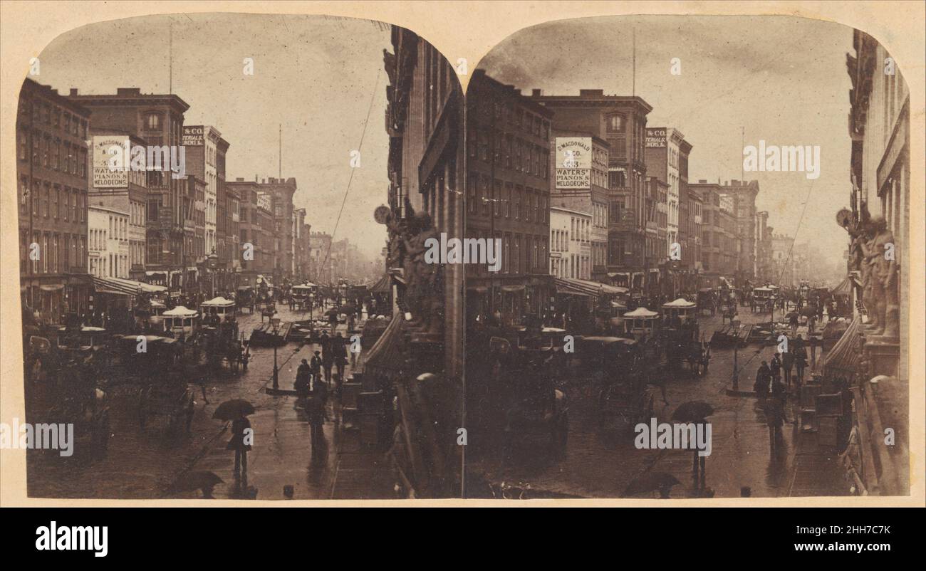 [Broadway in the Rain, probablement pris de 308 ou 310 Broadway, New York City] ca.1860s Edward Anthony américain Edward Anthony et son frère Henry ont été les fondateurs des premiers fabricants et fournisseurs de caméras et de fournitures photographiques de New York.En 1859, Anthony a publié une série de vues stéréographiques « instantanées » ou « d'action », dont Broadway on a Rainy Day.Remarquable pour sa clarté cristalline, la photographie a vendu des milliers d'exemplaires dans le 1860s et se classe toujours parmi les images les plus collectables de la ville de New York.Une stéréographe, communément appelé une vue stéréo, est un Banque D'Images