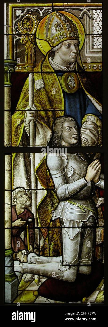 Panneau de vitraux avec un Chevalier et son patron Saint CA.1505–08 allemand ces quatre scènes font probablement partie du vitrage de l'église cistercienne de Mariawald, située au sud-ouest de Cologne.Ici, les peintres en verre de Cologne ont adapté la couleur à la tendresse traditionnelle du verre blanc, de sorte que de grandes zones de couleur saturée sont combinées avec des sections de grisaille également grandes.Ces fenêtres sont stylistiques liées aux fenêtres dans le nord de l'île de la cathédrale de Cologne.Panneau de vitraux avec un Chevalier et son Saint patron.Allemand. CA.1505–08.Pot métal, verre blanc, peinture vitreuse, s Banque D'Images