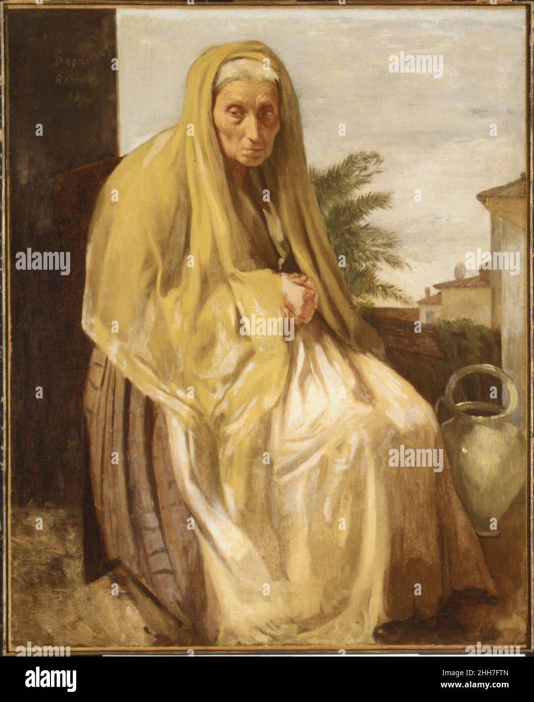 La vieille femme italienne 1857 Edgar Degas Français pendant les années de formation que Degas a passé à travailler en Italie, de 1856 à 1859, il a fait des copies après de vieux maîtres ainsi que des études d'hommes et de femmes en costume local,Ces deux sujets sont populaires dans la communauté des artistes français qui se sont enfermés à Rome.Ce tableau combine un style de figurine et une palette rappelant Poussin avec un œil pour les détails réalistes, évidents dans le rendu de la peau de la femme et des mains gnarlées.Monumental et peu épargnant, l'image évite la sentimentalité pittoresque commune à beaucoup d'images contemporaines de paysans et de begga Banque D'Images