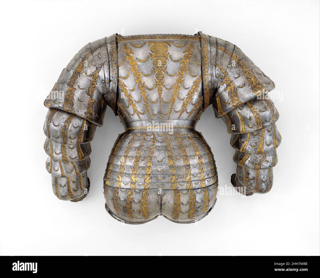 Plaque arrière et Hoguine (Rump Defense) d'une armure de costume ca.1525 Kolman Helmschmid German cette armure reproduit en acier le costume extravagant à revers et à revers de la Landsknechte allemande (troupes d'infanterie mercenaire).Les pièces assorties sont conservées au Musée de l'Armée, Paris.En provenance de l'arsenal de Radziwill à Nesvizh en Biélorussie actuel, cette armure a peut-être été faite pour Jerzy Herkules Radziwill (1480–1541), un puissant noble polonais.Écoutez des experts illuminer l'histoire de cette œuvre Écoutez ou faites une pause #4431.Backplate and Hoguine (Rump Defense) lecture ou pause #2209.Panneau arrière Banque D'Images