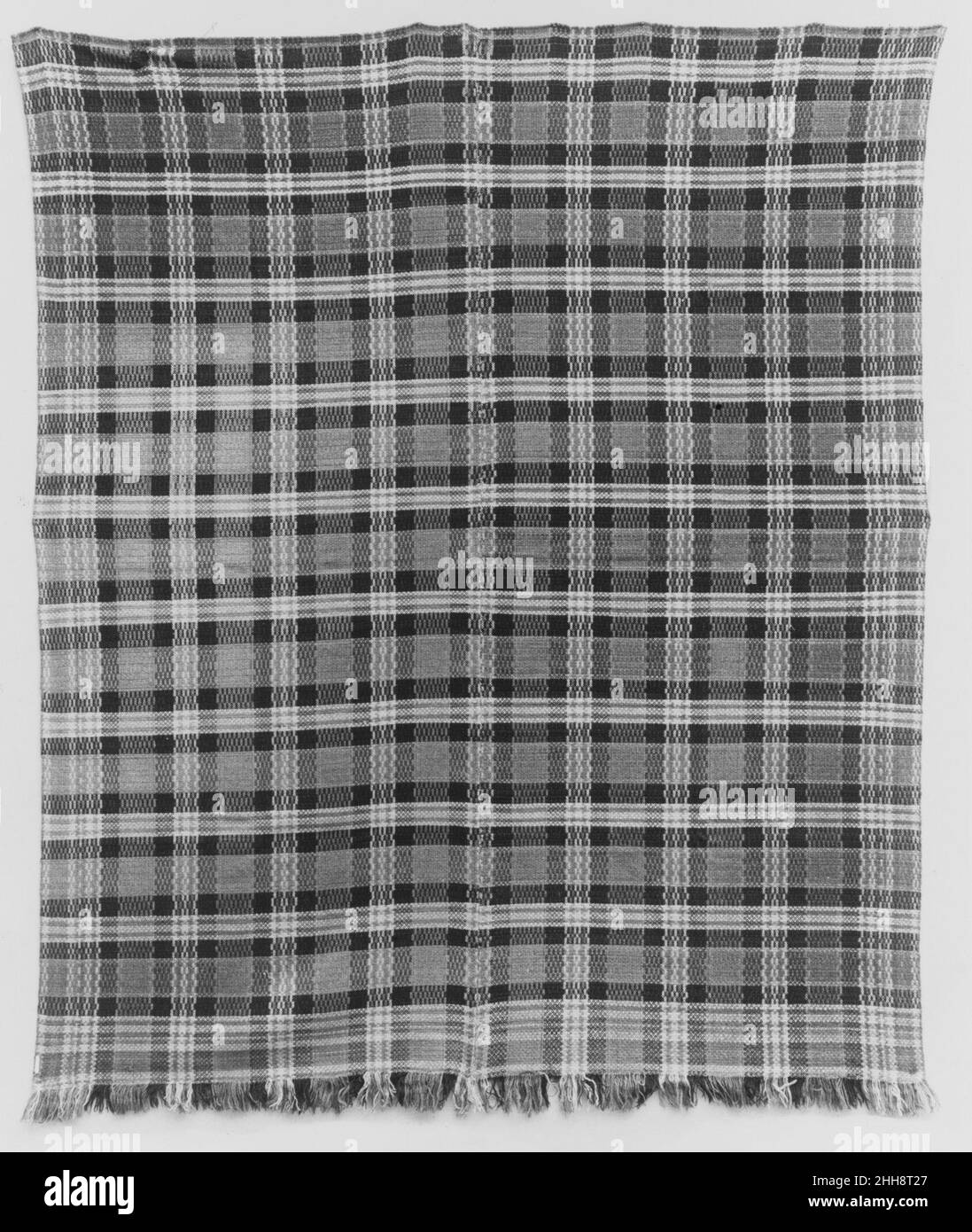 Couvre-lit à motif écossais ca.1840 américain ce couvre-lit à carreaux est tissé de laine brune, bleue, jaune et orange en deux panneaux et est encadré au centre.Il a une frange naturelle le long du fond.Couvre-lit en tissu écossais 13633 Banque D'Images
