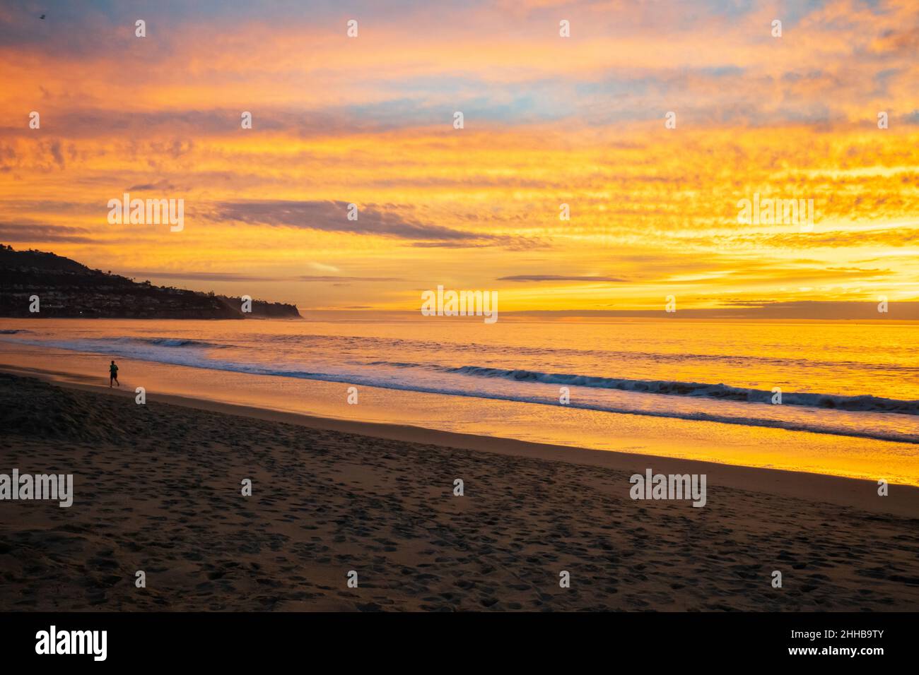 Jogging Sunset Beach Banque D'Images