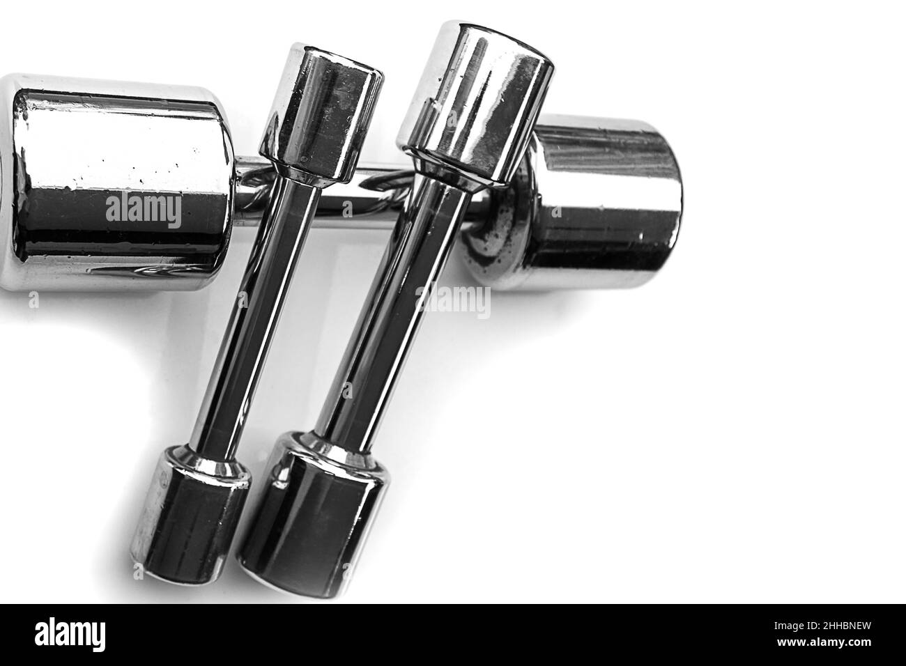 Poids ou haltères, sports sur fond blanc Banque D'Images