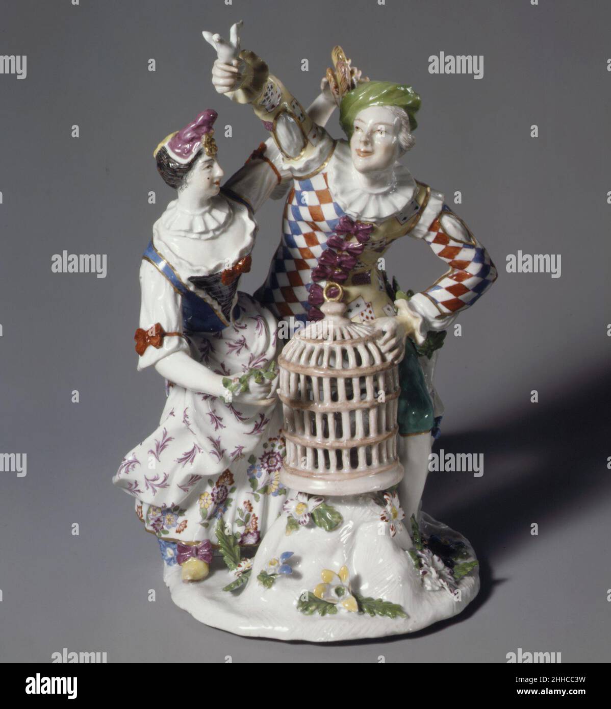 Harlequin et Columbine avec cage à oiseaux ca.1762 Ansbach Manufacture de poterie et de porcelaine.Harlequin et Columbine avec cage à oiseaux 203235 Banque D'Images