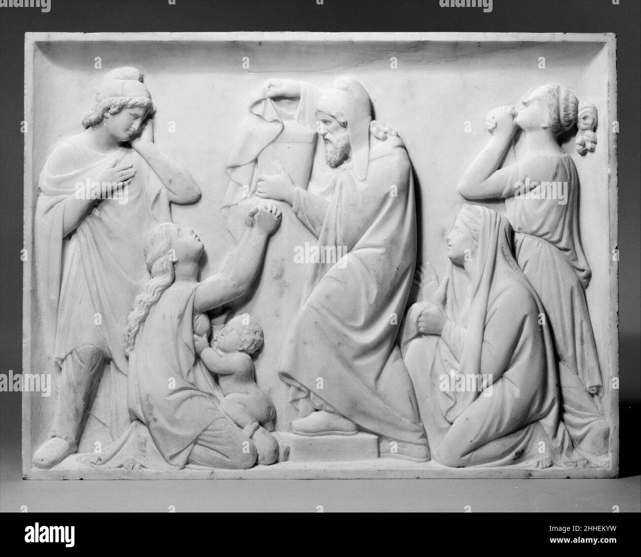 Priam tenant l'urne d'or avec les restes de Hector 19th siècle Giovanni Maria Benzoni un des quatre panneaux (99,9c–f) qui a décoré à l'origine les côtés du piédestal de marbre de 99,9a, b, Hector et Andromache.Ce soulagement, le quatrième relief de la séquence, provient de l'Iliad XXIV de Homer, 795-97.Priam tenant l'urne d'or avec les restes de Hector 209061 Banque D'Images