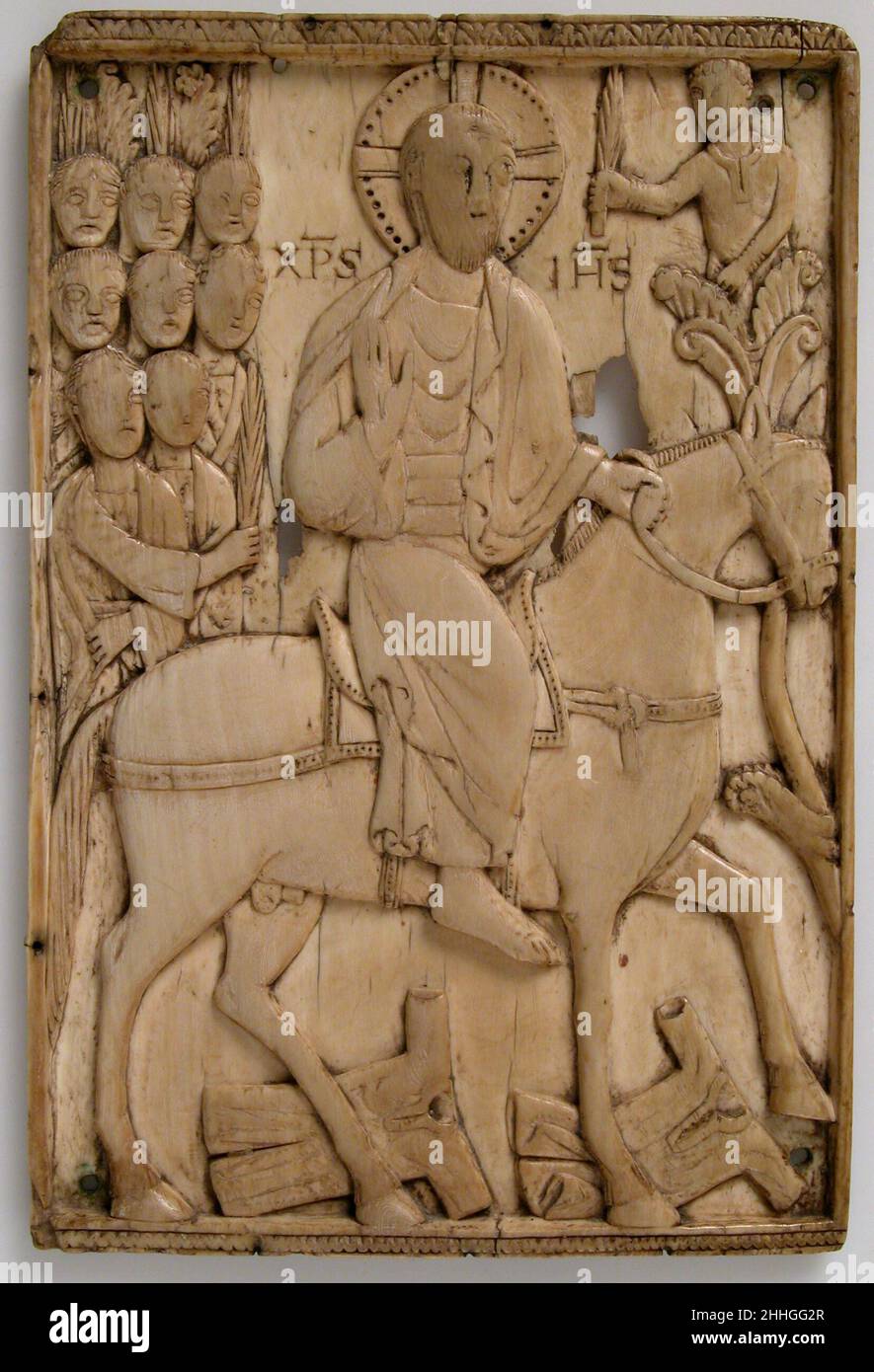 Plaque avec l’entrée de Jésus à Jérusalem 900–925 Ottonien probablement partie d’un grand cycle narratif de la vie de Jésus, cet ivoire montre son entrée triomphale à Jérusalem.Cet incident, dans lequel la population l'a salué comme roi avec des branches de palmier et des cloques, lance la séquence des événements qui ont conduit à la Crucifixion.Plaque avec l’entrée de Jésus à Jérusalem 464464 Banque D'Images