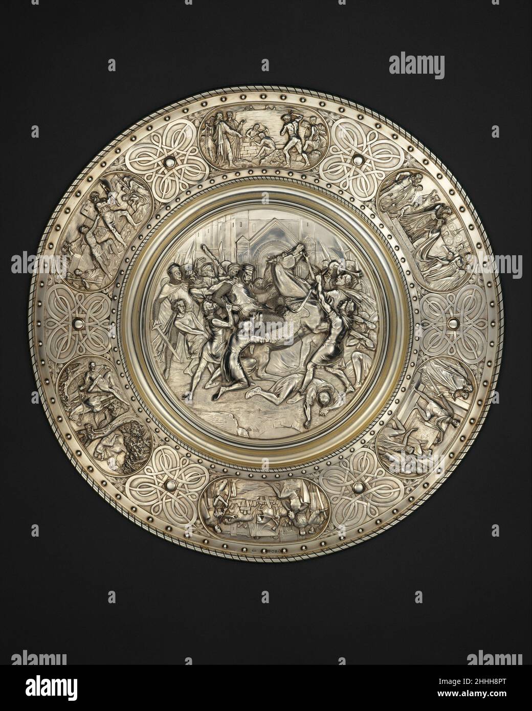 La Stockbridge Cup 1870 conçue par Henry Hugh Armstead British ce grand plat a remporté le prix de la course Stockbridge, qui a lieu chaque année, avec une « tasse » d'argent pour le propriétaire du cheval gagnant.La valeur de l'argent étant la valeur monétaire du prix, en 1870 la valeur du prix était de 280 livres, une somme considérable alors.Le nom du cheval gagnant était Mortimer et le propriétaire était un T. French.La longueur du parcours était de sept furlongs (1,75 miles). Les scènes autour de la frontière et au centre de la plaque rappellent les jours des premiers rois normands William I, William II, et Henry I Banque D'Images