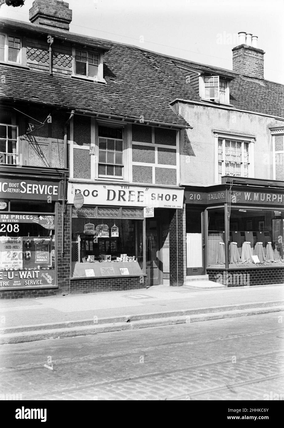 High Street, W. Murphy Tailor, Uxbridge 1936 Banque D'Images
