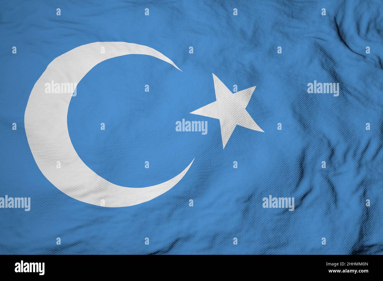 Gros plan plein format sur un drapeau d'ondulation d'Uyghur en rendu 3D. Banque D'Images