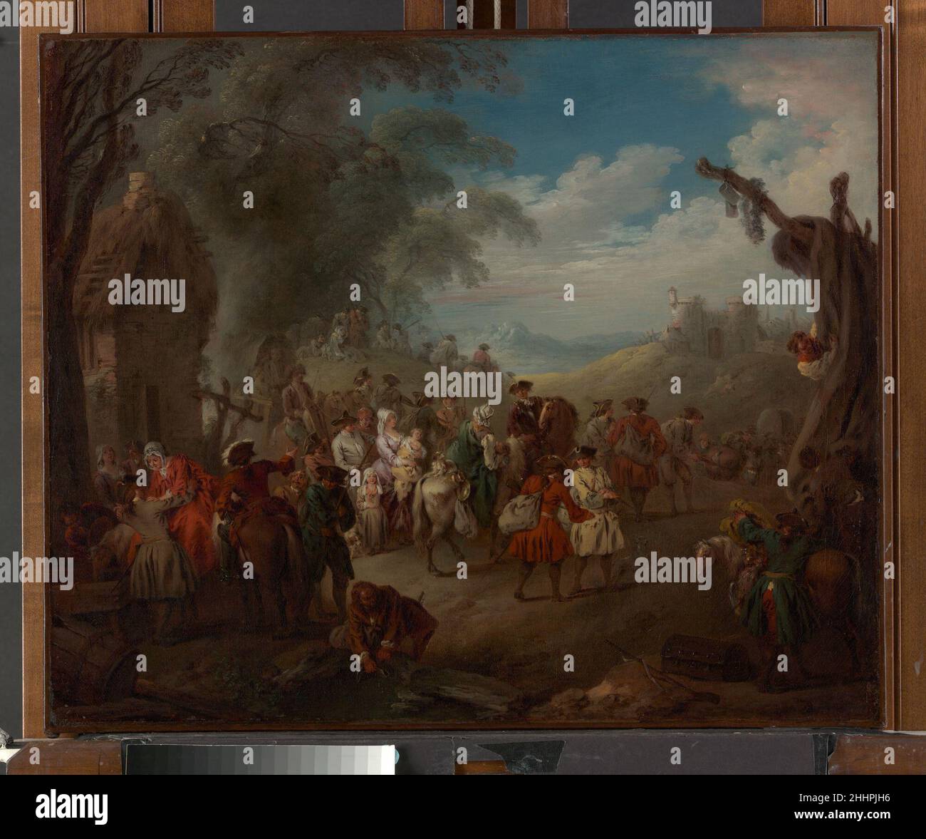 Les troupes sur la marche ca.1725 Jean-Baptiste Joseph Pater Français Élève de Watteau, Pater est né au nord à Valenciennes, une région qui, ayant appartenu aux pays-Bas espagnols, avait été restaurée en France en 1678.Les guerres de Louis XIV avaient ravishé les territoires du Nord et Pater aurait vu les séquelles.En tant que jeunes hommes, lui et Watteau ont tous deux peint des sujets militaires.Les marcheurs, observés de près, portent une robe contemporaine et portent des armes et des sacs de munitions.Les adeptes du camp avec des bébés, des casseroles et des poêles, et les chiens d'animal de compagnie marchent et se promènent à côté d'eux.Troupes le 437260 mars Banque D'Images