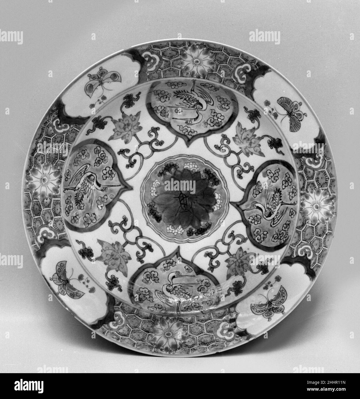 Plaque de Chine.Plaque.Chine.Porcelaine avec émail vert famille.Dynastie Qing (1644–1911), période Kangxi (1662–1722).Céramique Banque D'Images