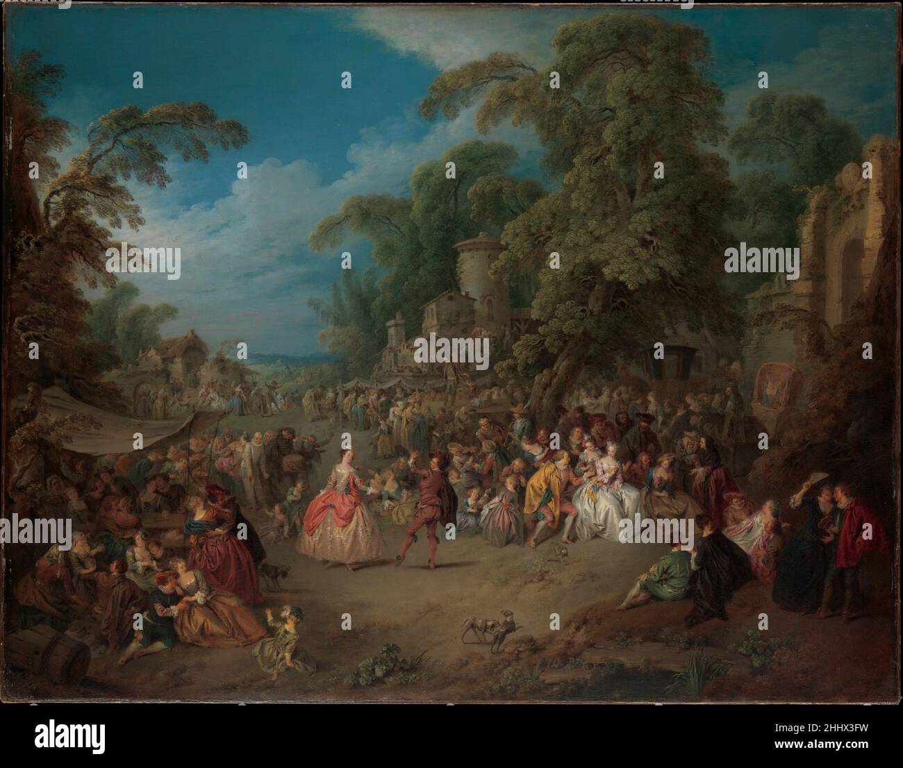 La foire de Bezons ca.1733 Jean-Baptiste Joseph Pater French ce tableau, le chef-d’œuvre de Pater, représente une foire qui se tient chaque année à l’extérieur de Paris le premier dimanche de septembre.L'événement a inspiré une pièce de théâtre, un ballet-pantomime, et plusieurs œuvres d'art au cours du XVIIIe siècle, lorsque les divertissements populaires ont régulièrement inspiré la haute culture.Les gens de toutes les classes de la société sont représentés en appréciant les festivités; l'atmosphère idyllique, faire croire découle de l'œuvre d'Antoine Watteau.La danseuse principale peut être Mademoiselle d'Angeville, une actrice célèbre.Derrière elle se trouve Pierrot, un stock Banque D'Images