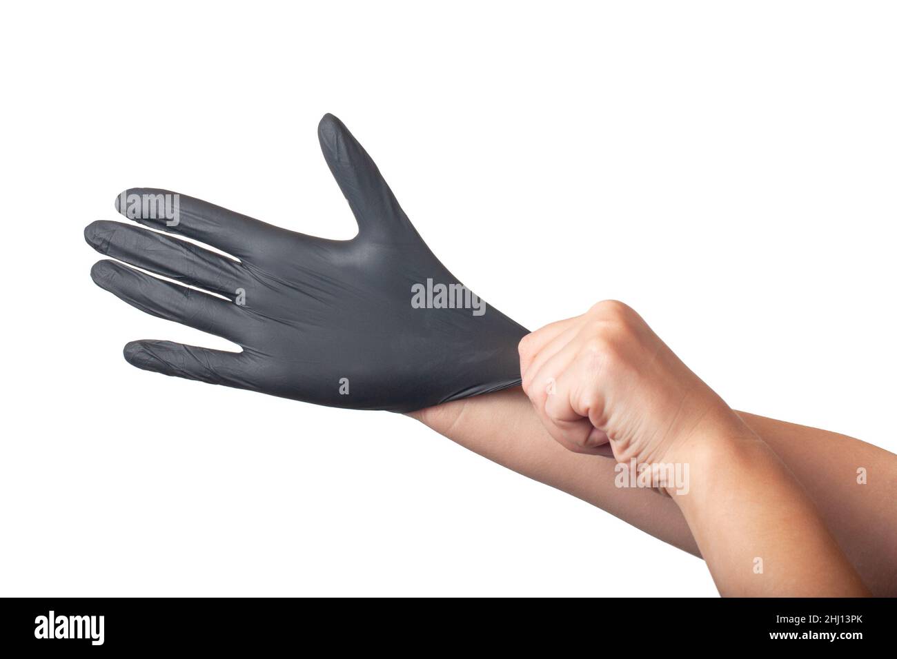 Gant en caoutchouc noir à la main isolé sur le blanc Photo Stock - Alamy