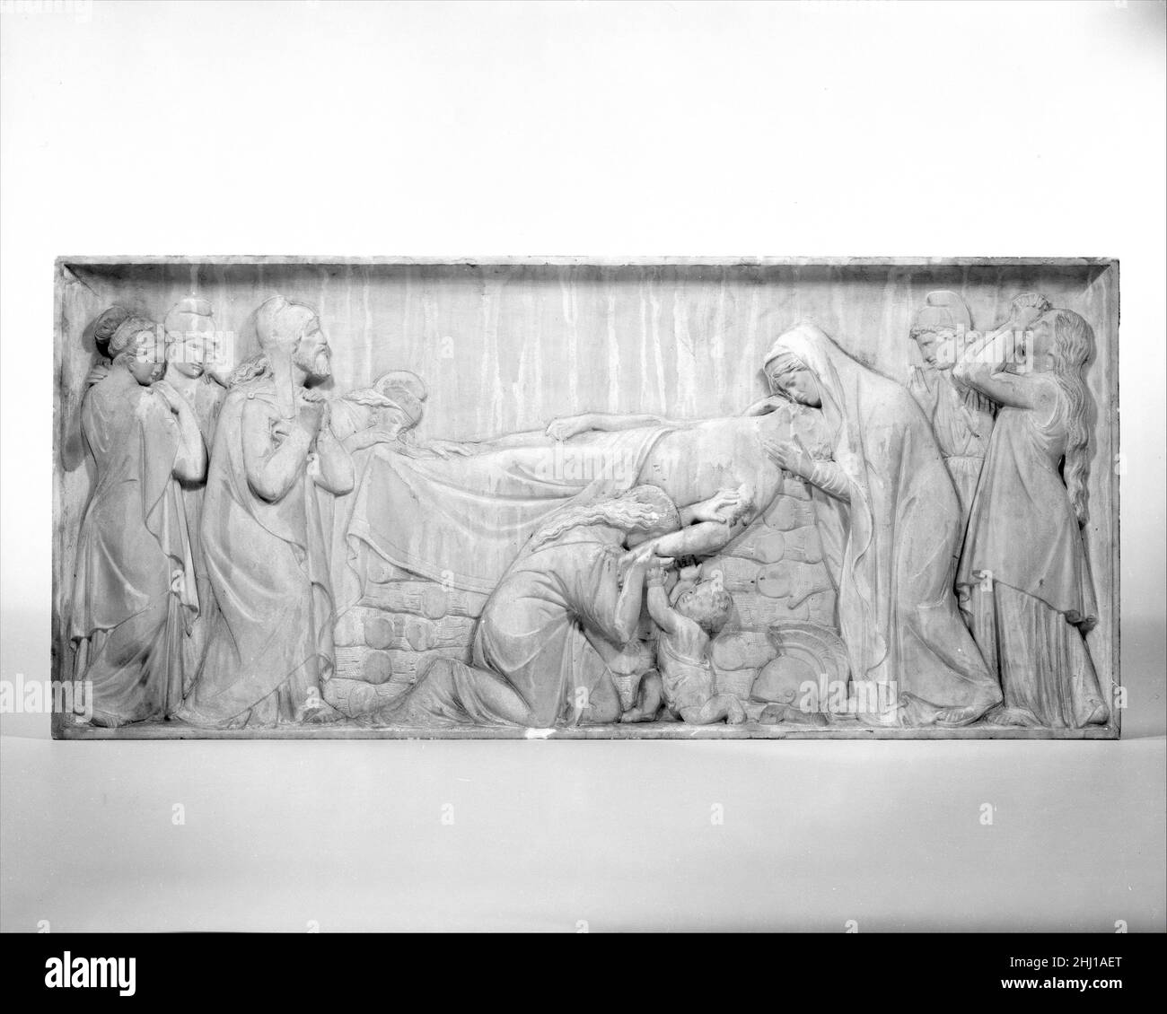 Hector couché sur son pyre funéraire 19th siècle Giovanni Maria Benzoni un des quatre panneaux (99,9c–f) qui a à l'origine décoré les côtés du piédestal en marbre de 99,9a, b, Hector et Andromache.Ce relief, le troisième relief de la séquence, provient de l'Iliad XXIV de Homer, 780-87.Hector allongé sur son pyre funéraire 209062 Banque D'Images