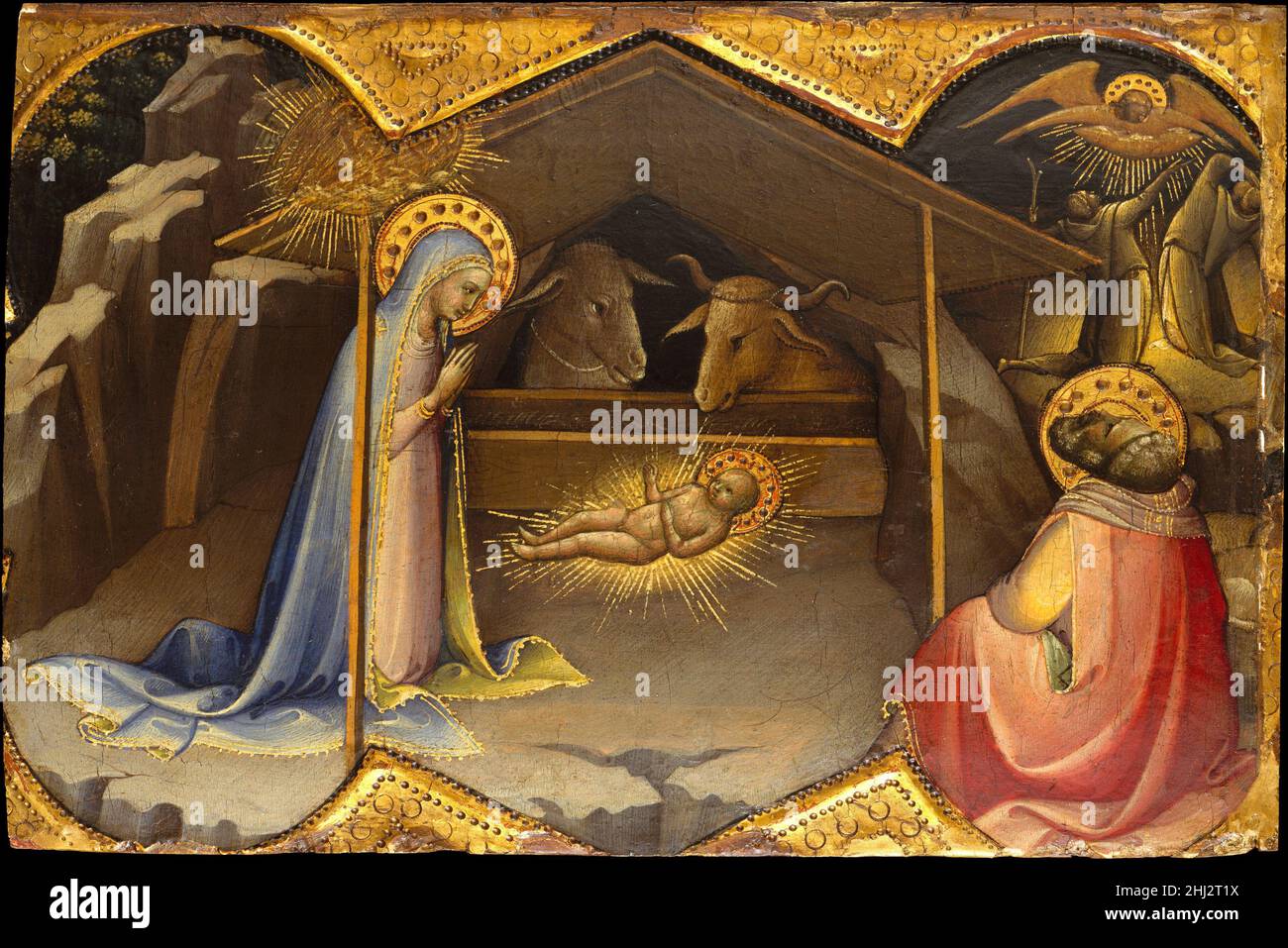 La Nativité ca.1406–10 Lorenzo Monaco (Piero di Giovanni) Italien Lorenzo Monaco, le principal peintre de Florence au début du XVe siècle, est un peintre de manuscrits illuminés, de fresques et de tableaux.Promoteur majeur du style gothique international, son style se caractérise par une couleur lumineuse et des lignes fluides, rythmiques et gracieuses.Dans cette exquise représentation de la Nativité, les éléments de composition sont brillamment adaptés au champ de la quatrefroil, et les harmonies de couleur riches et subtiles reflètent la compétence de l'artiste en tant que peintre manuscrit.Particulièrement le strikin Banque D'Images