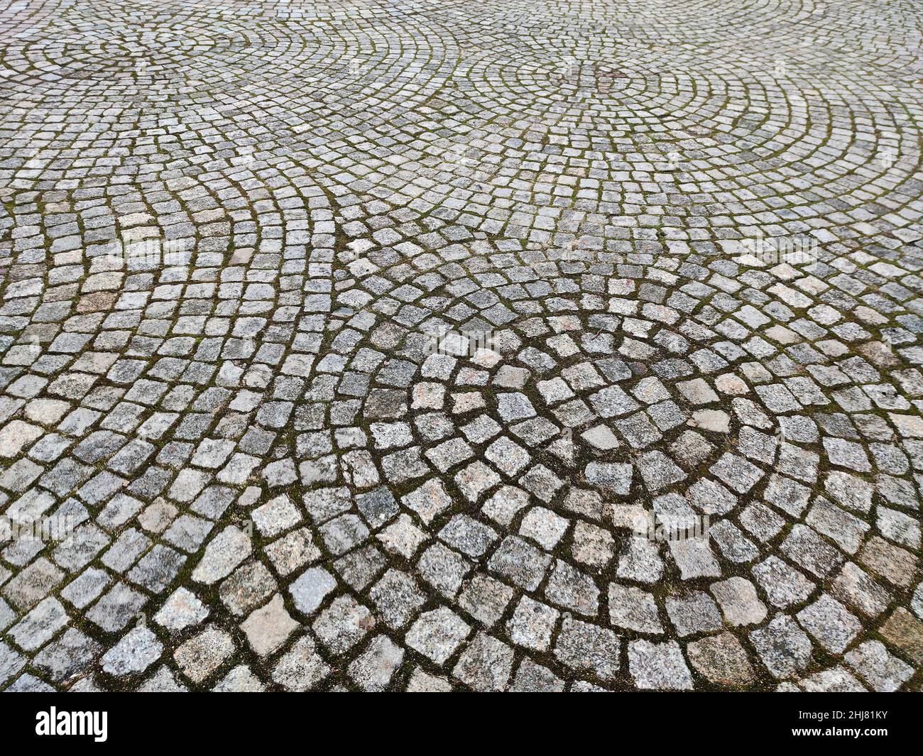 Texture de pavage de pierre.Arrière-plan structuré abstrait. Pavés en pierre sur la rue kaliningrad Banque D'Images